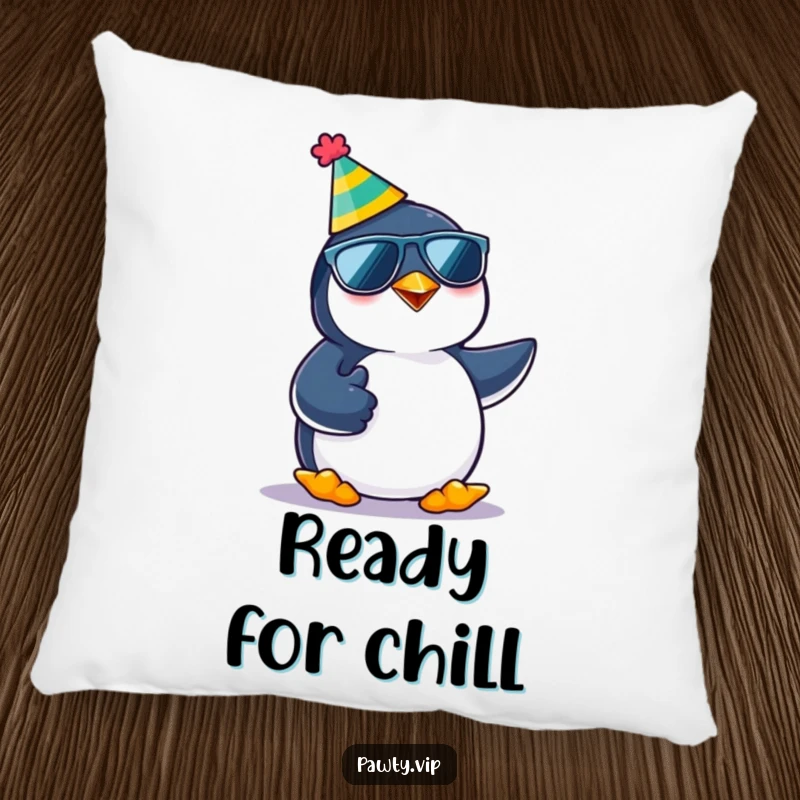 Funny kawaii penguin character in a party hat and sunglasses, giving a thumbs up, printed on a soft pillow for humorous comfort.