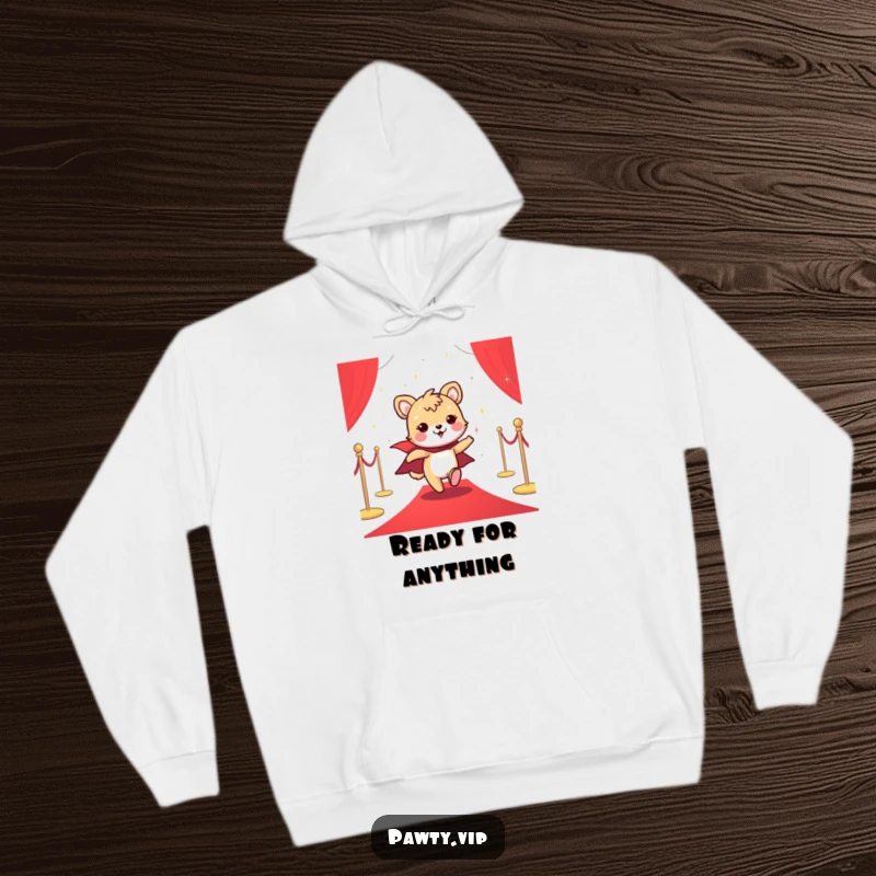 Funny hoodie with a cheerful animal character in a dazzling sparkly cape, confidently striding across a grand red carpet.