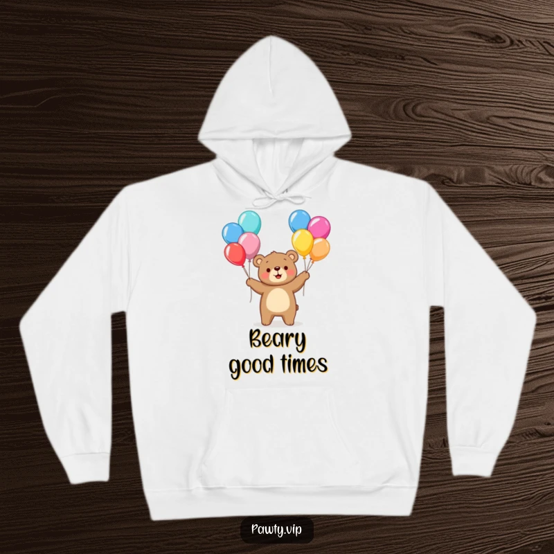 Funny bear character juggling colorful balloons on a cozy hoodie, offering warmth and cheerful, celebratory vibes.